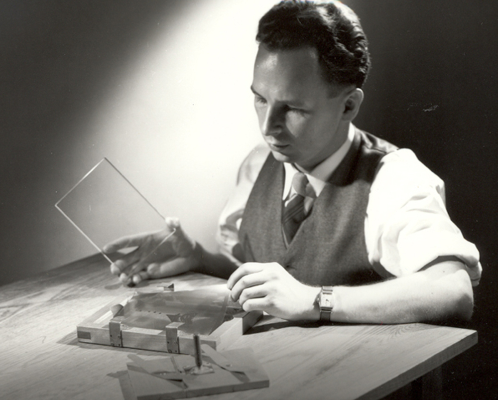 Dr. Don Stookey, in 1950, prepares to expose an image to ultraviolet light. Stookey, who forever changed cooking with the invention of CorningWare, also developed photosensitive glass that led to color picture tubes for TV.