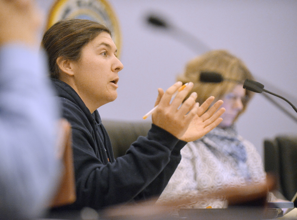 Cape Elizabeth Town Councilor Caitlin Jordan speaks out against the ordinance banning roosters on smaller properties following public discussion on the issue Thursday.