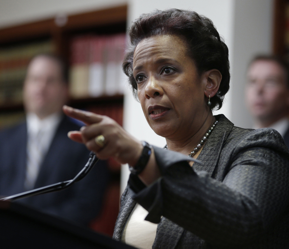 In this April 28, 2014 file photo, Loretta Lynch, U.S. Attorney for the Eastern District of New York speaks during a news conference in New York.