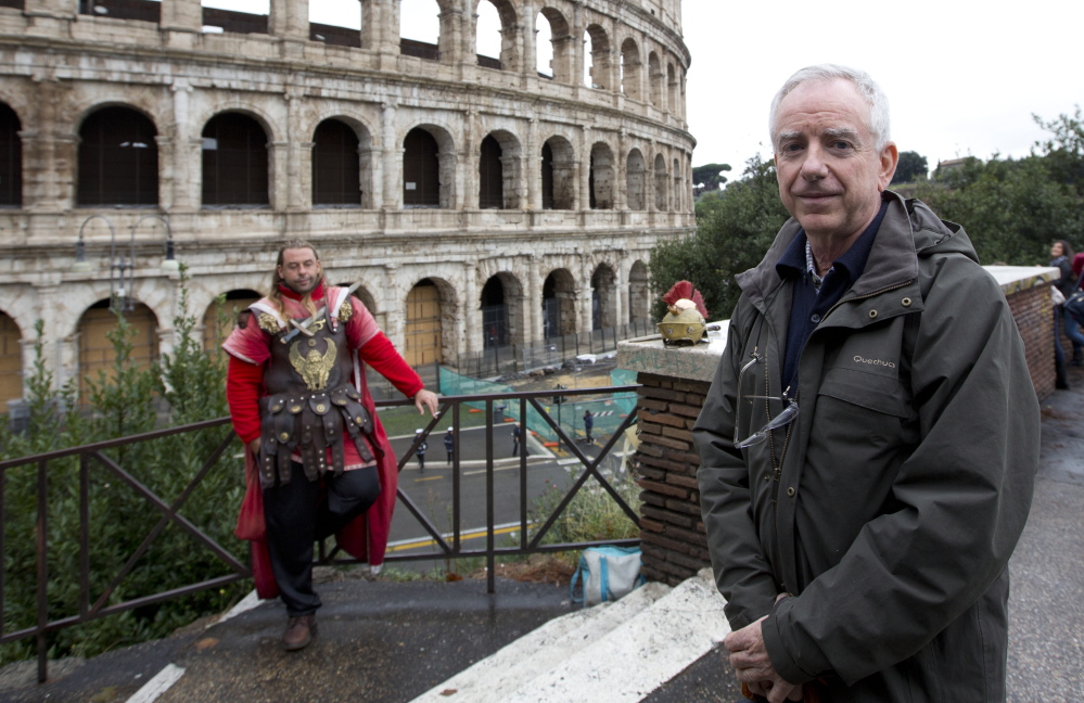 Archaeologist Daniele Manacorda posing in front of Rome’s Colosseum on Friday proposes to return the Colosseum’s storied arena to its original state.