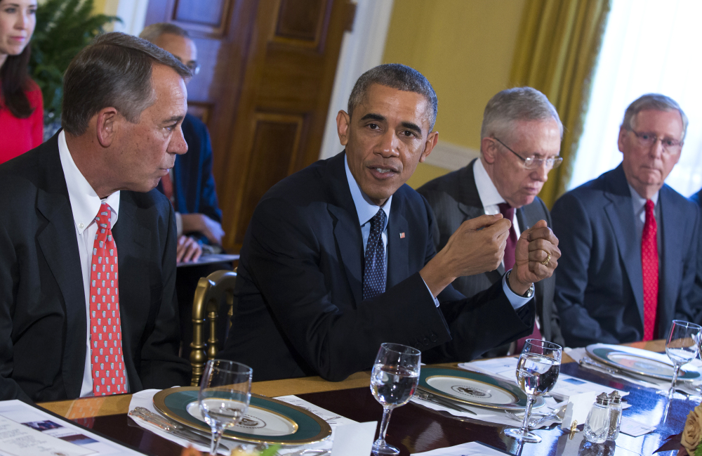President Obama meets with Congressional leaders in the Old Family Dining Room of the White House in Washington on Friday.
