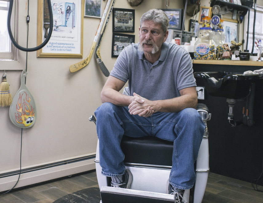 Ron Miller sits in his barbershop in Greene, a town that voted heavily for Paul LePage. “With our town, there was no doubt we would vote (for)LePage. ... The way I look at things, being a barber now, and a U.S. Navy diver for 20 years, I’m not politically correct at all. But the one thing about here, is your opinions matter. I like to hear all sides,” Miller said.