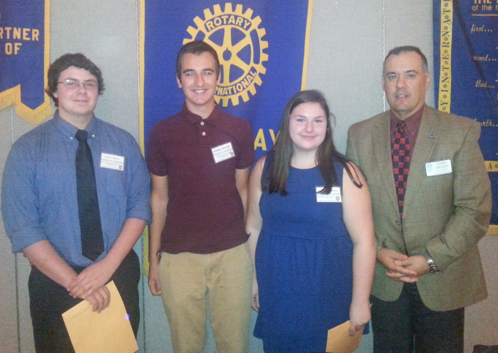 Rotary Club of Saco Bay president Chris Jacques with Students of the Month for October: Amanda Kimball of Biddeford High School; Daniel Picard of Thornton Academy in Saco; and Craig Finley of Old Orchard Beach High School.