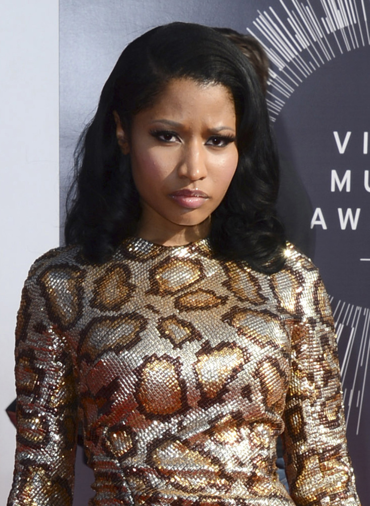 Nicki Minaj says she's sorry if the Nazi imagery in her video offended anyone.
