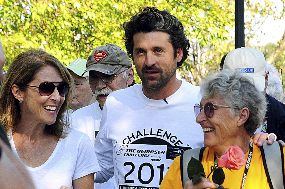 Actor Patrick Dempsey prepares to start the Survivor Walk with his mother, Amanda, right, and Laura Davis, winner of the Amgen Breakaway from Cancer Award, in Lewiston during the Dempsey Challenge in 2011. Amanda Dempsey died from the disease in March 2014.