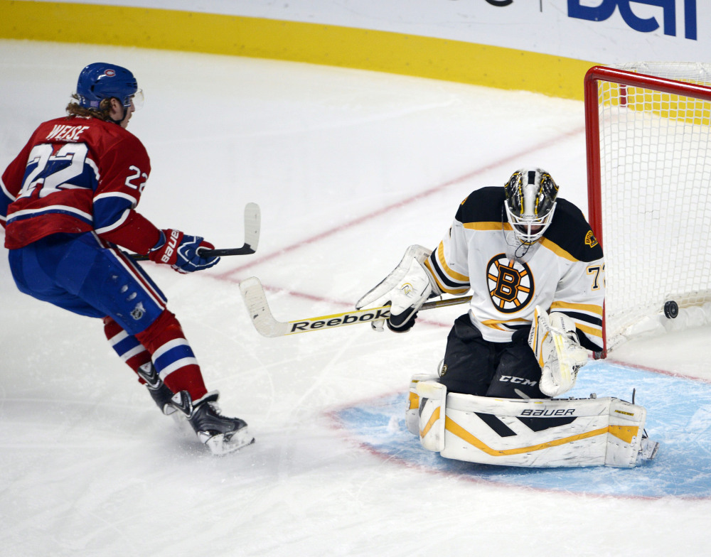 Montreal Canadiens right wing Dale Weise scores against Boston Bruins goalie Niklas Svedberg on a penalty shot during the second period of Thursday night's game in Montreal.