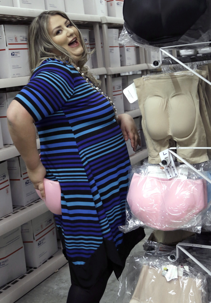 Jessica Asmar, owner of Feel Foxy, shows off a pair of butt-enhancing padded panties at her warehouse in Katy, Texas. Asmar says 2014 has been the manufacturer’s best year since launching nearly a decade ago.
