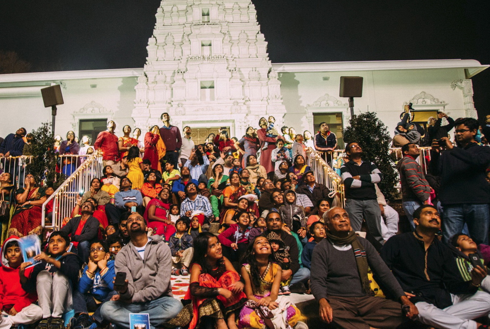 Devotees at the Sri Venkateswara Temple in Penn Hills, Pa., celebrate the Diwali Festival of Lights with a fireworks display in front of the temple.