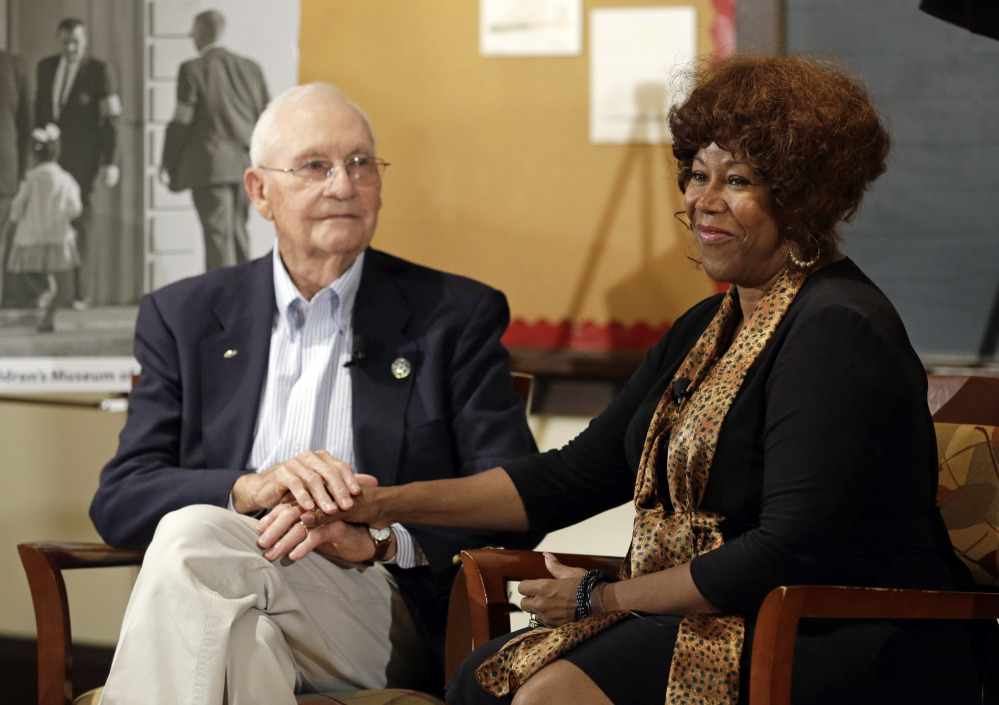 Ruby Bridges, right, who integrated Louisiana schools in 1960 under escort from U.S. Marshals, meets with Charles Burks, who was one of those marshals, in Indianapolis, Ind., on Friday.
