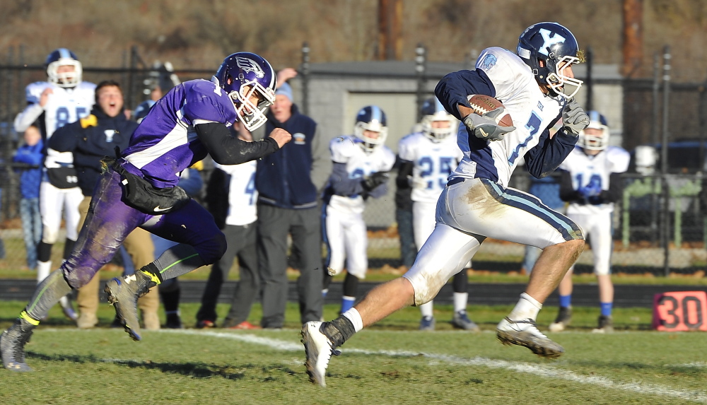 York #7, Jordan Pidgeon, takes the ball all the way to a second touchdown, for a comeback by York in the final minutes as Marshwood beats York in the finals of the Western Class B Football Championship. Gordon Chibroski/Staff Photographer