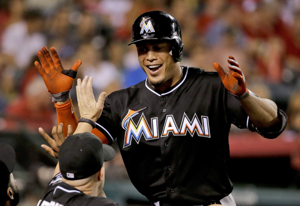 Miami’s Giancarlo Stanton, whose season ended on Sept. 11 when he was hit in the face by a pitch, still led the National League with 37 home runs and a .555 slugging percentage.