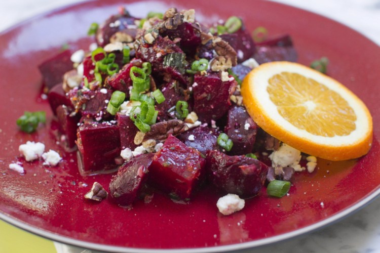 Roasted beets with orange vinaigrette, pecans and goat cheese.