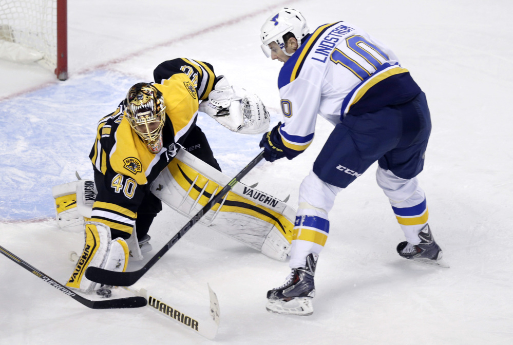 Boston goalie Tuukka Rask makes a save on a shot by St. Louis Blues left wing Joakim Lindstrom during the third period Tuesday night. Rask shut out the Blues in a 2-0 win.