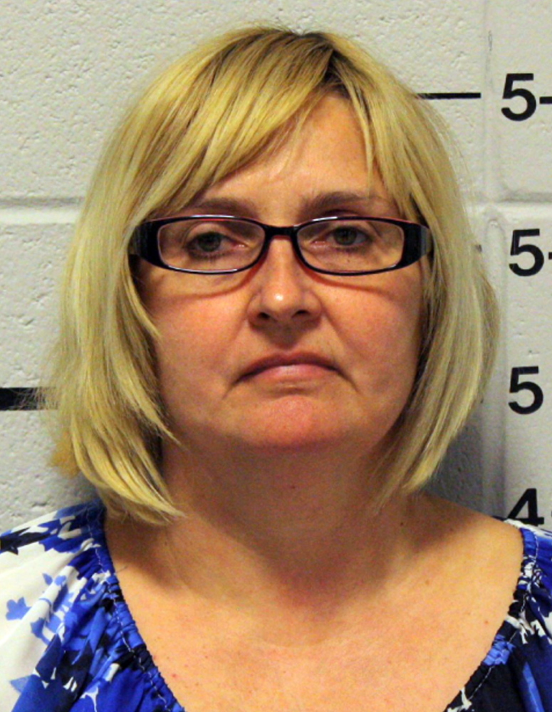 Genevieve Kelley was charged Monday with custodial interference for fleeing with her 8-year-old daughter a decade ago.