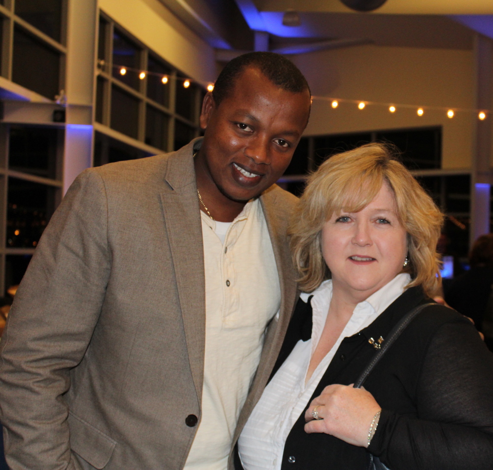 Arsene Sebaziga of the Maine Department of Transportation with Kathy Kern, a member of Engineers Without Borders.