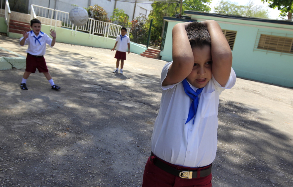 An autistic child plays with fellow students at the Dora Alonso School in Havana in 2013. Advocates for people with autism hope that the Vatican’s first conference on the disorder will help raise awareness of it, particularly in Spanish-speaking countries.