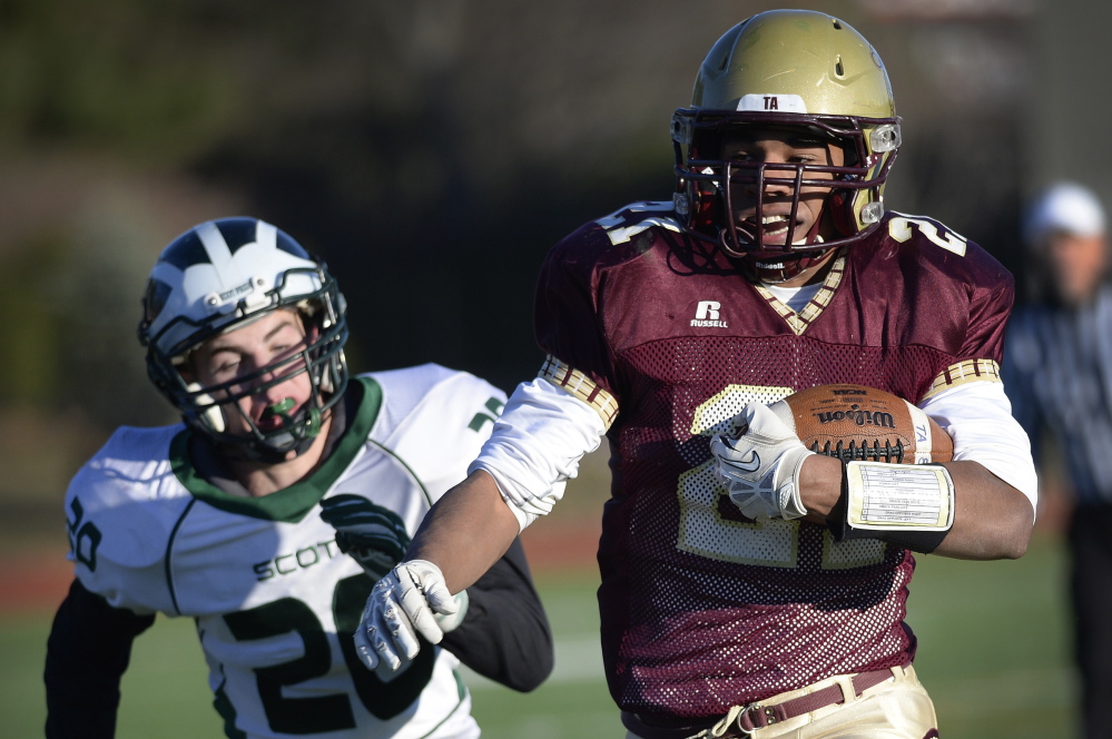 It’s a sight that’s been seen a lot this season: A Thornton Academy runner – in this case, Greg Ruff – heading to the end zone with a defender in pursuit. The Trojans have averaged more than 47 points per game and, yes, that poses a huge challenge for Windham.