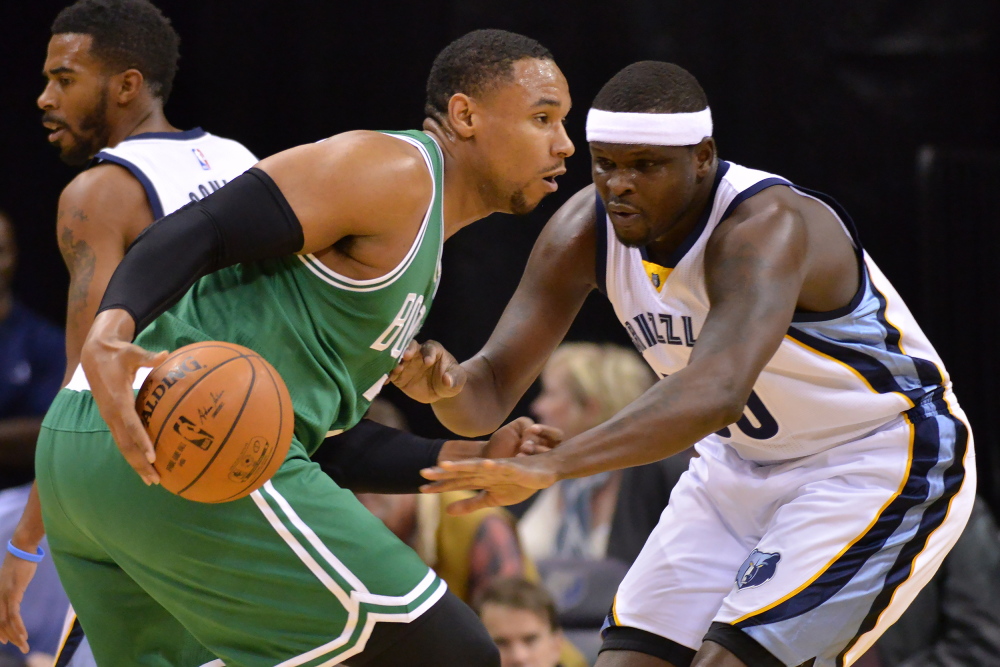 Boston Celtics forward Jared Sullinger drives against Memphis Grizzlies forward Zach Randolph in the first half of Friday night’s game in Memphis.