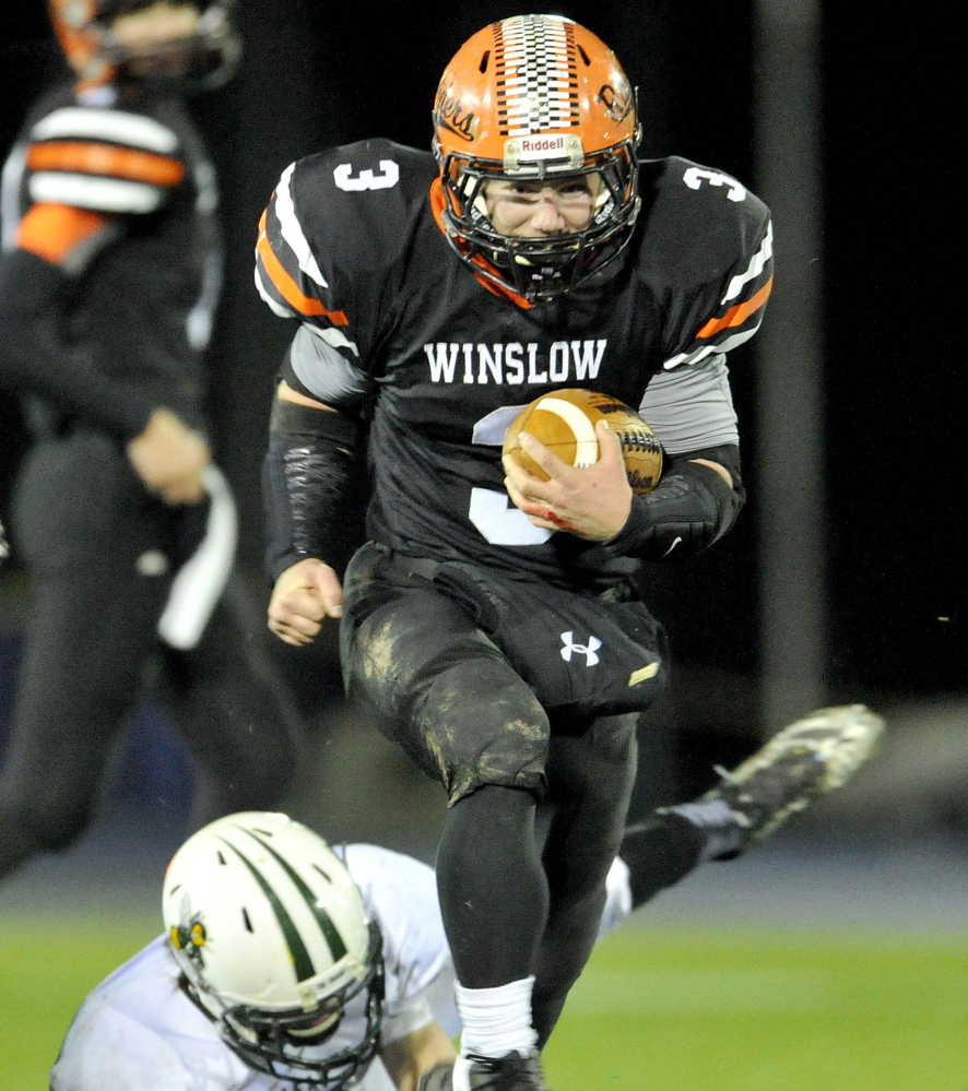 Dylan Hapworth of Winslow heads down the field, and he was doing plenty of that Friday night. Hapsworth scored seven touchdowns and gained 236 yards in a 62-14 victory against Leavitt in the Class C state final at Orono.