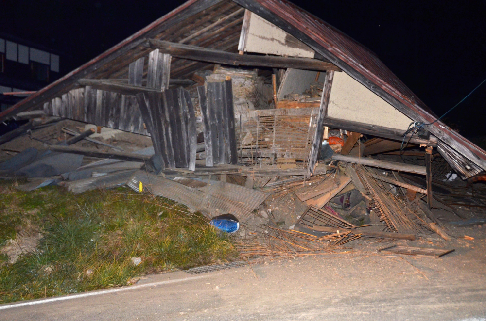 A house is collapsed after a strong earthquake hit in Hakuba, Nagano Prefecture, central Japan, on Saturday.