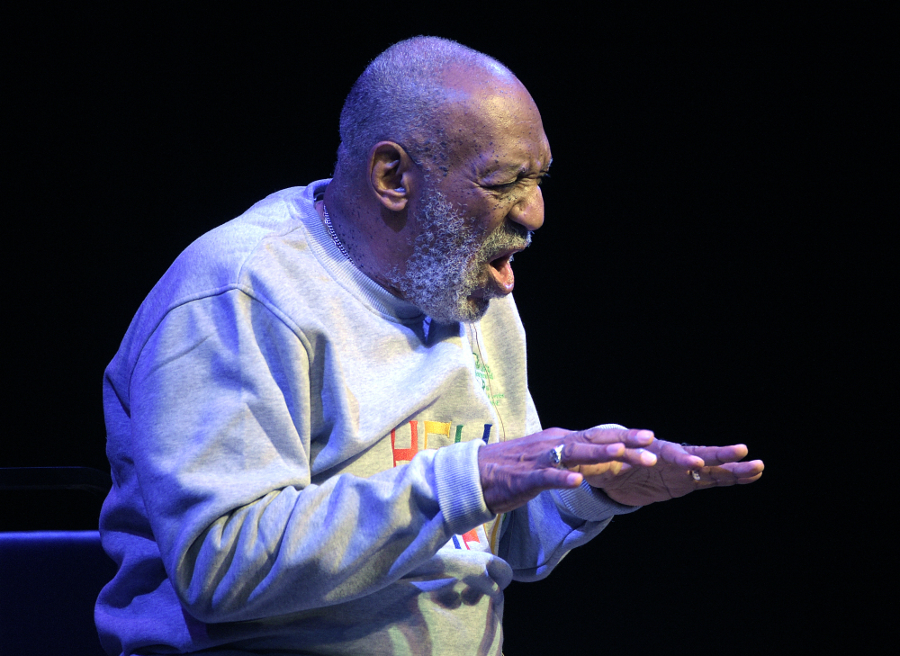 Comedian Bill Cosby performs at the Maxwell C. King Center for the Performing Arts, in Melbourne, Fla., Friday. Performances by Cosby in Nevada, Illinois, Arizona, South Carolina and Washington state have been canceled as more women come forward accusing the entertainer of sexually assaulting them years ago.