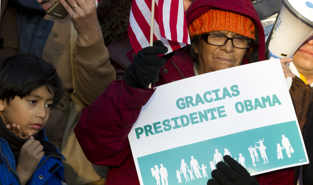 Supporters of immigration reform attend a rally in front of the White House in Washington on Friday, thanking President Obama for his executive action on illegal immigration.