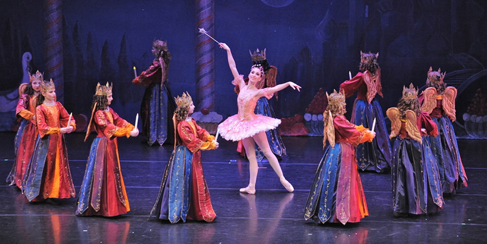 The Sugar Plum Fairy is surrounded by Angels who watch over the Land of the Sweets in Maine State Ballet’s “The Nutcracker.” “Wouldn’t want anyone smuggling in vegetables,” director Linda MacArthur Miele jokes.