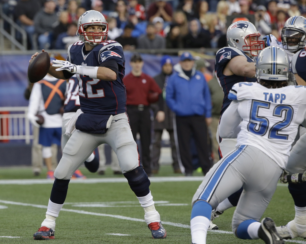  Tom Brady throws a pass against the Detroit Lions on Sunday in Foxborough, Mass. 
The Associated Press