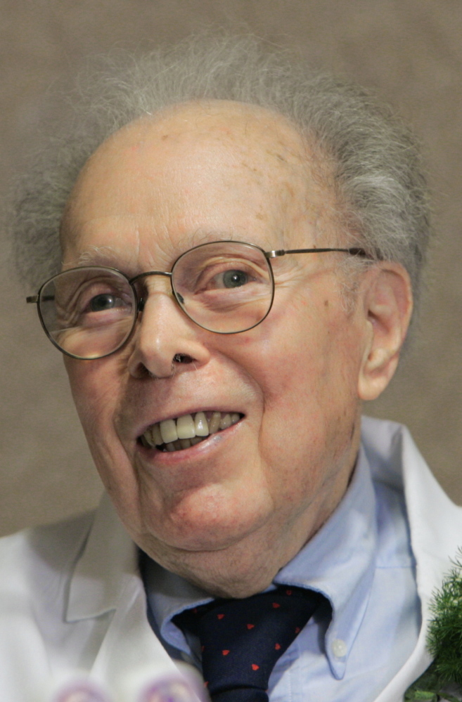 Dr. Denham Harman, shown at his 90th birthday celebration, died Tuesday at age 98.