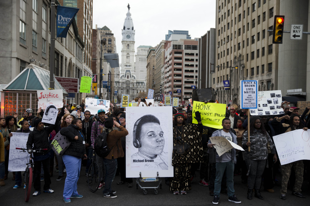 Demonstrators protest Tuesday in Philadelphia.