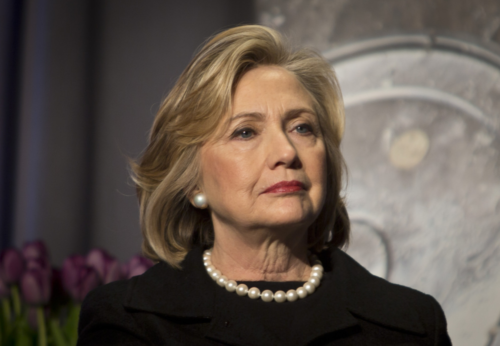 Hillary Clinton listens before delivering remarks at an event Friday in New York. Clinton has praises President Obama’s executive actions to stave off deportation for millions of immigrants living in the U.S. illegally, but has been less forthcoming on other issues in the early days of the 2016 presidential campaign.