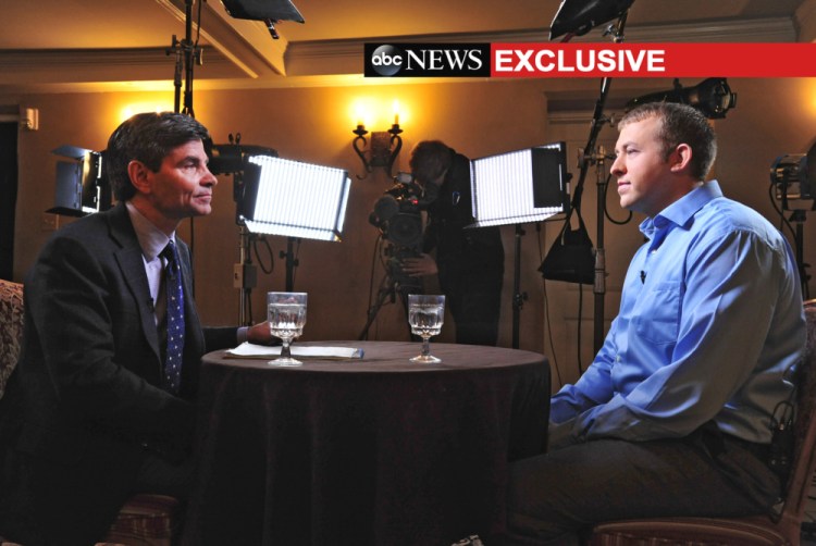 In this photo provided by ABC News, ABC News’ chief anchor George Stephanopoulos, left, interviews Ferguson, MO., police officer Darren Wilson, Nov. 25, 2014 in Missouri.