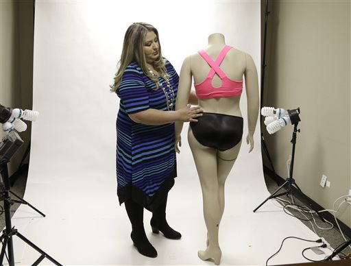 Jessica Asmar, owner of Feel Foxy, repositions a mannequin wearing a pair of padded panties in the studio at her Katy, Texas warehouse. The Associated Press