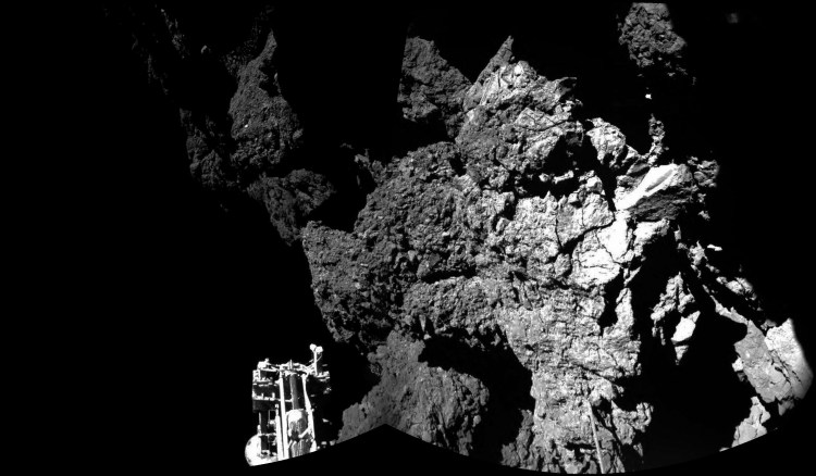 This composite image released by the European Space Agency on Thursday shows  Rosetta's lander Philae on the surface of Comet 67P/Churyumov-Gerasimenko. One of the landers three feet can be seen in the foreground. The Associated Press. 