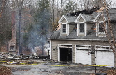 The State Fire Marshal’s Office is investigating the cause of the fire that destroyed this house at 12 Inverness Road in Falmouth late Saturday.
Jill Brady/Staff Photographer