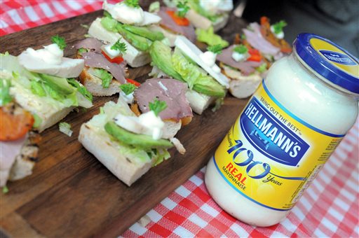 Hellmann's owner Unilever filed a lawsuit against a California company that uses the word "Mayo" in its sandwich spread name, saying that federal regulators and dictionaries define mayonnaise as a spread that contains eggs. The Associated Press