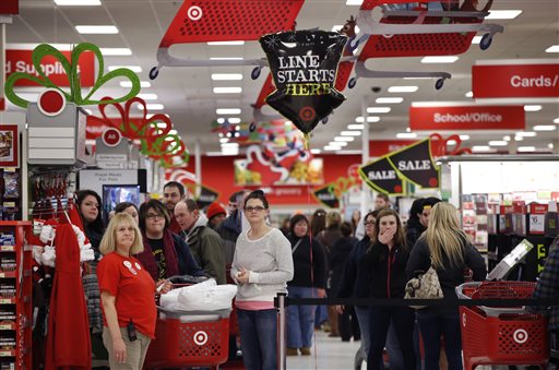 Target shoppers wait to check out on Black Friday in South Portland. The store opened at midnight. 