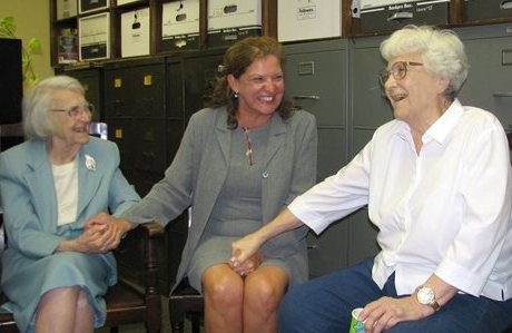 Alice Lee, left, accepts birthday wishes from Monroe County Circuit Judge-elect Dawn Hare, center, and her sister, Pulitzer-winning author Harper Lee, right, in Monroeville, Ala., in this Sept. 11, 2006, photo. The Associated Press