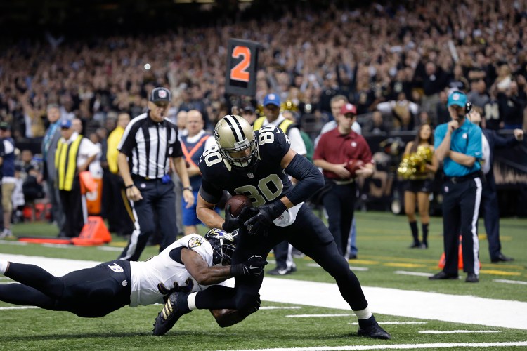 New Orleans Saints tight end Jimmy Graham (80) scores a touchdown reception in the first half of an NFL football game against the Baltimore Ravens in New Orleans, Monday. The Associated Press