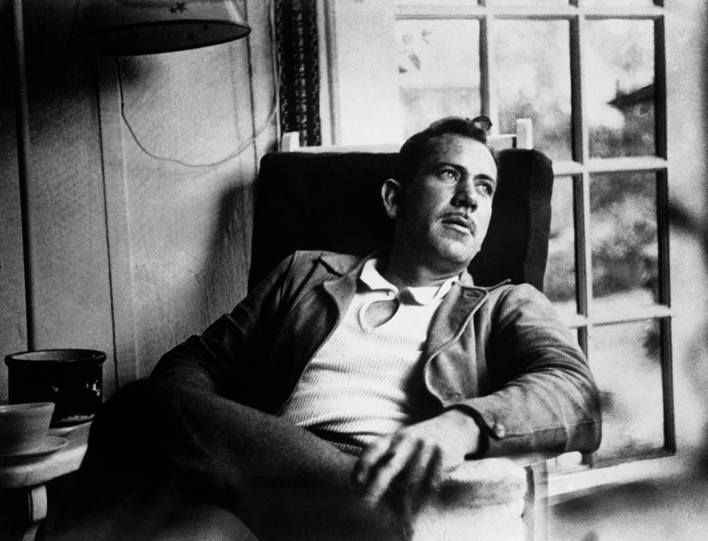 In this undated file photo, American author John Steinbeck, takes a rest from work on a new novel.
