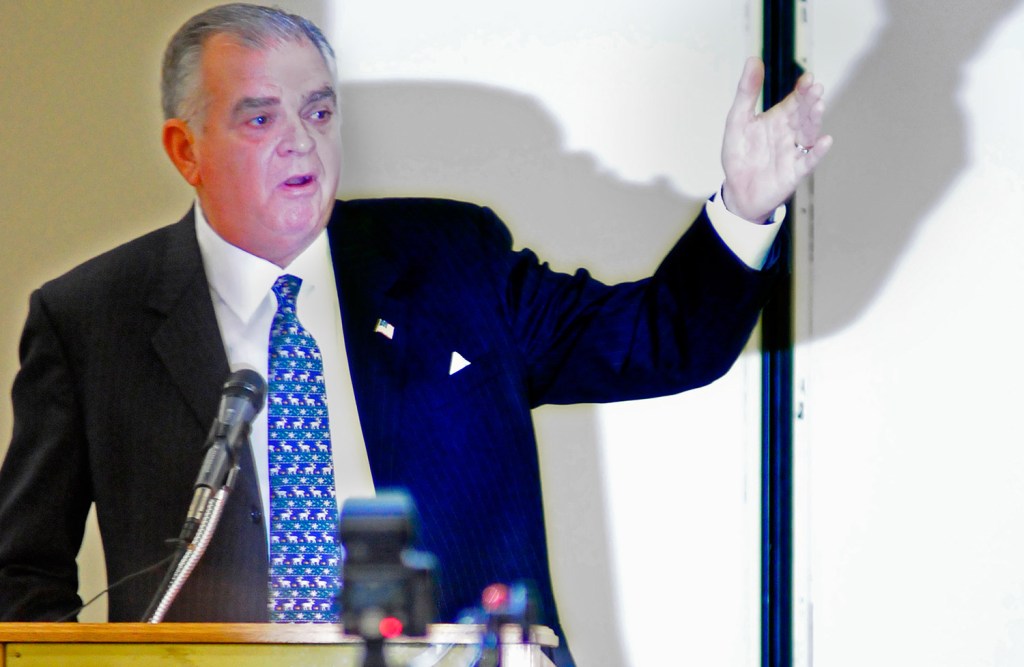 Ray LaHood, former U.S. secretary of transportation, gives the keynote address Thursday at the Maine Transportation Conference at the Augusta Civic Center. He told the audience, "America has become one big pothole."