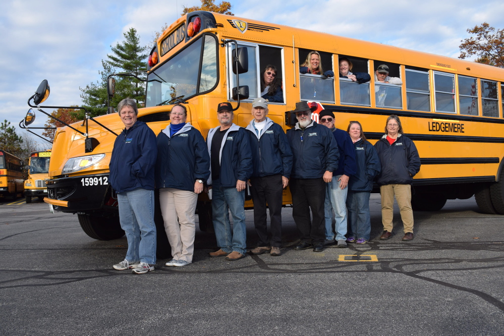 The Parent Teacher Student Association at Wells Elementary School sponsored a Bus Driver Appreciation Week to acknowledge and thank bus drivers. Among those honored were, inside bus from left, Jean LaRiviere, Christine Towne, Tabitha Bergeron and Richard Bissell, and, standing outside bus, from left, Lauren Clark, Rochelle Greenwood, Bill Cochran, Joe Nugent, Dan Hungerford, John Harris, Tammy Bissell and Debbie Carmel. Reg Bennett photo