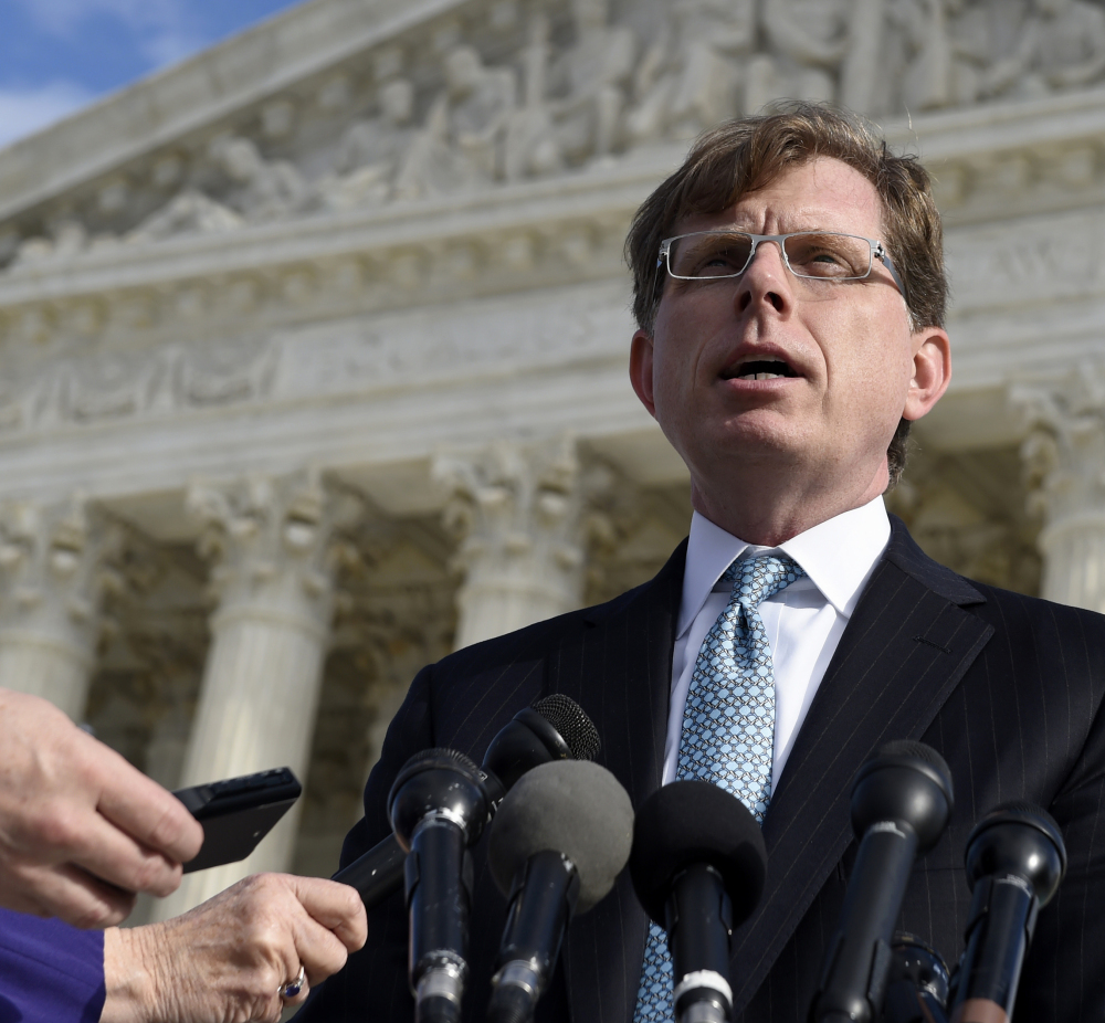 John P. Elwood, attorney for Anthony D. Elonis, who claimed he was just kidding when he posted a series of graphically violent rap lyrics on Facebook about killing his estranged wife, shooting up a kindergarten class and attacking an FBI agent, speaks to reporters outside the Supreme Court in Washington on Monday.