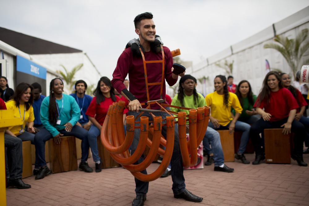 Artists perform during the inauguration of Climate Change Conference in Lima, Peru, on Monday. Delegates from more than 190 countries will meet in Lima for two weeks to work on drafts for a global climate deal that is supposed to be adopted next year in Paris.
