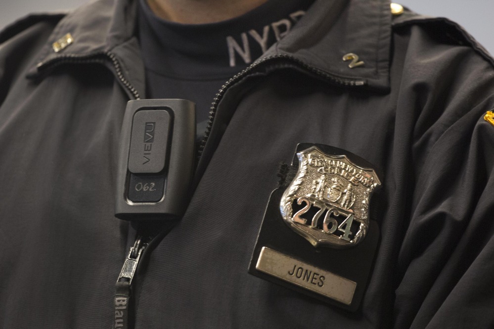 New York Police Department officer Joshua Jones wears a VieVu body camera on his chest during a news conference on Wednesday in New York. The nation’s largest police department is beginning with an experimental deployment of the cameras that will record encounters between police and civilians.