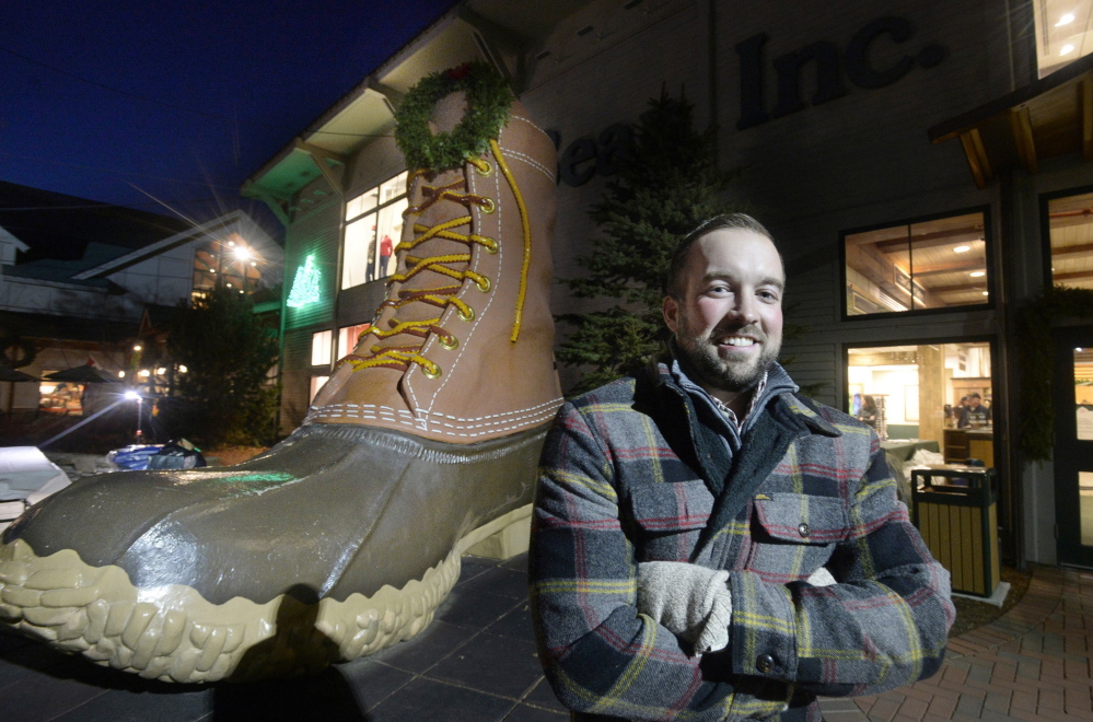 The company’s flagship store on Main Street in Freeport has some Bean boots in stock, says L.L. Bean district manager Corey Bouyea, seen standing outside the Freeport store last month.