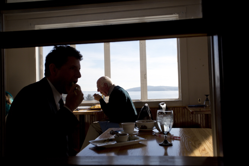 John Holmes of Belfast, at window, lunches at Seng Thai, where the views of the mouth of the Passagassawakeag River and Belfast Bay are spectacular.