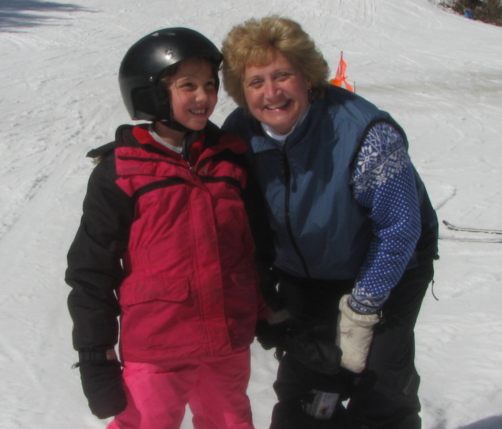 Cindy Dubois, right, a volunteer with Central Maine Adaptive Sports, teaches Jaclyn Sweet to ski at Lost Valley.
