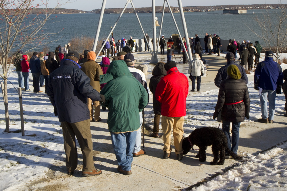 People gather at Fort Allen Park in Portland on Sunday to commemorate the anniversary of the Pearl Harbor bombing. Carl D. Walsh/Staff Photographer