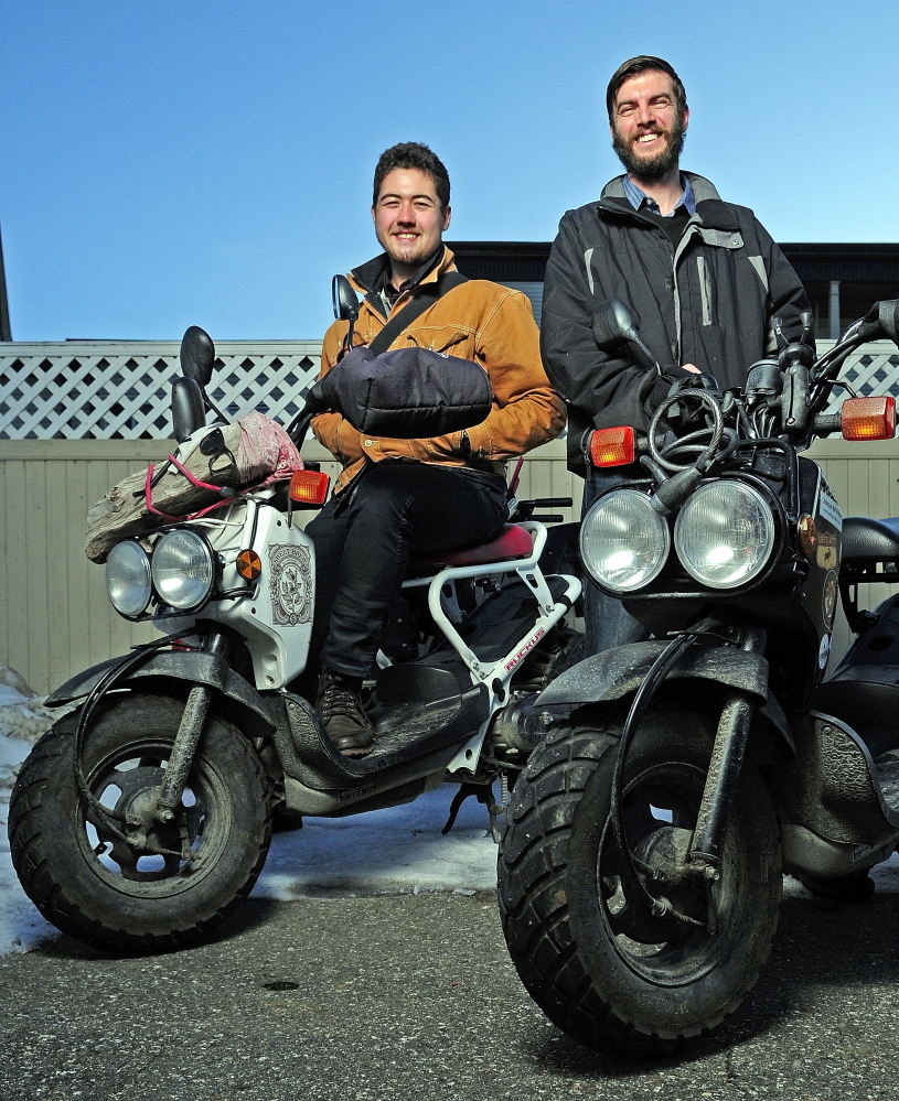 Myles Chung, left, and Dan Emery used these Honda scooters to travel around the country as they learned about hunger and hunger programs in America.